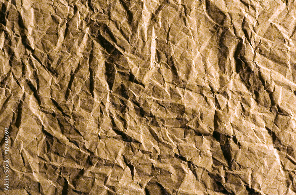 Naklejka premium Crumpled wrapping paper background
