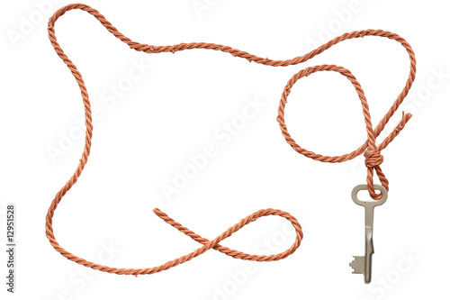 Frame made from red rope with key isolated on white