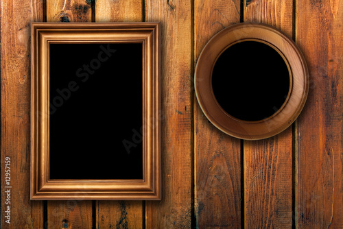vintage frames on wooden background