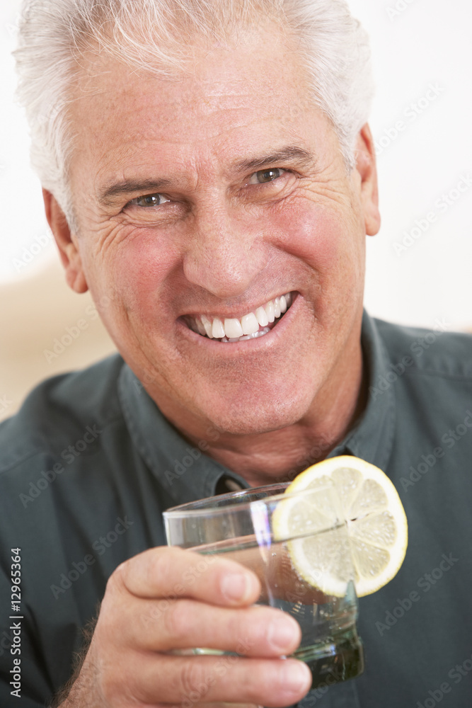 Man Having A Drink At Home Man Having A Drink At Home