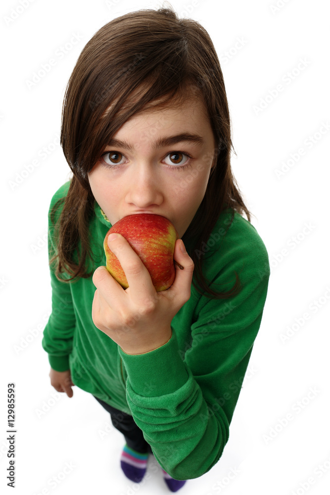 Young girl holding apple isolated on white background
