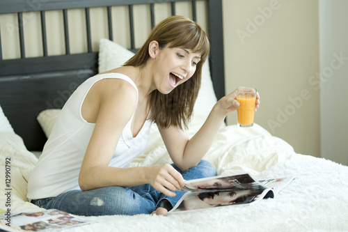 woman read a star magazine photo