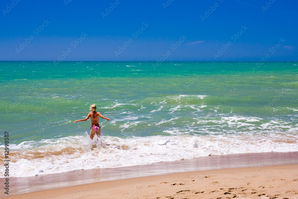 a beutiful woman on the beach in Mediterranean a beutiful woman on the beach in Mediterranean