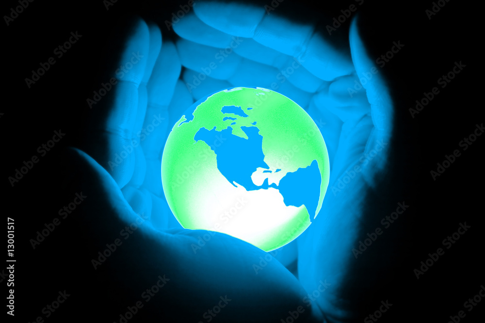 hand holding globe world