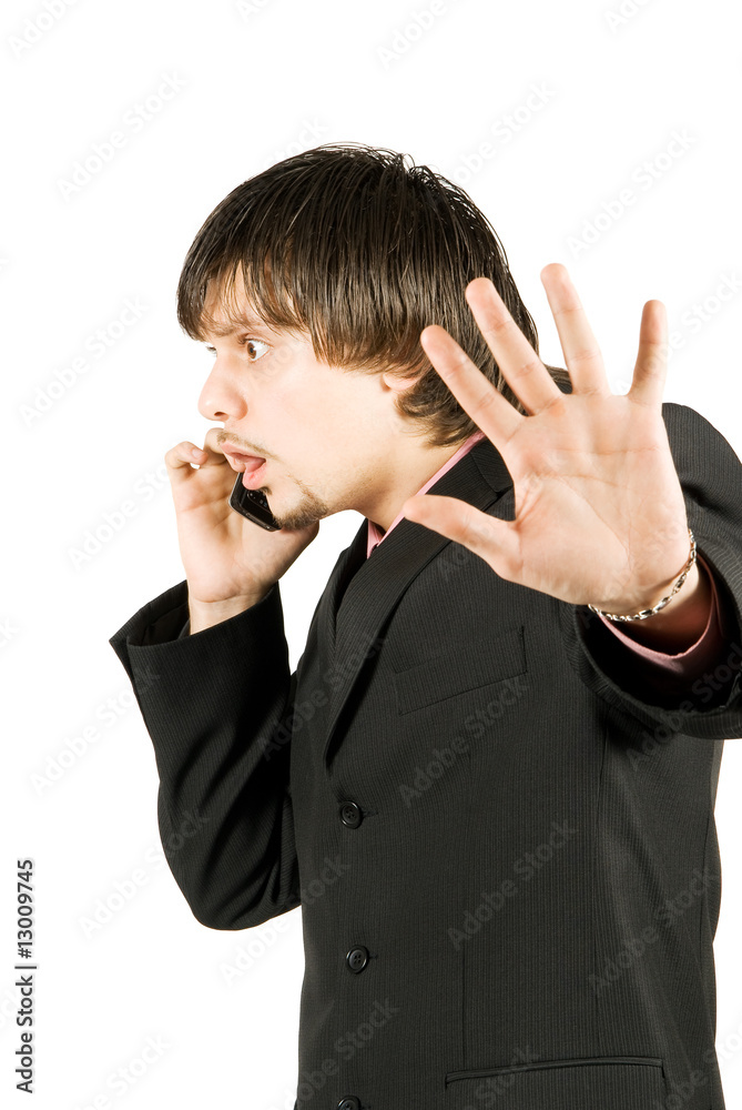 Upset businessman with cellular phone over white, no comments po Upset businessman with cellular phone over white, no comments po