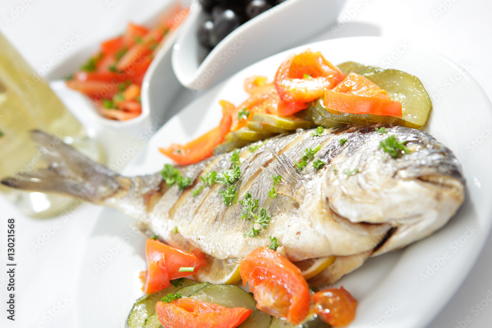 Roasted gilt-head bream with vegetables