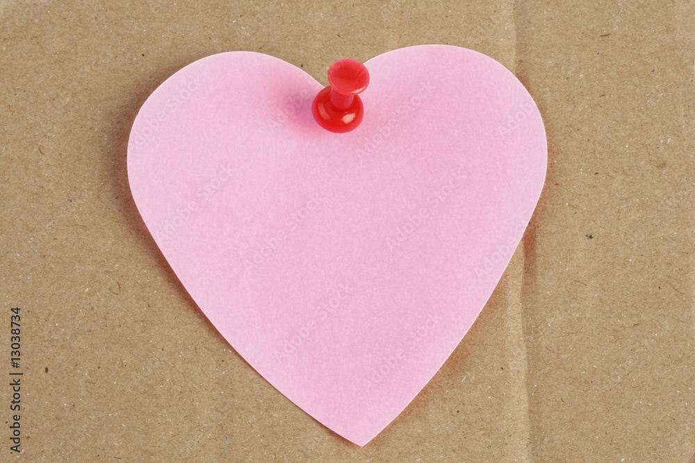 heart shaped post-it on cardboard heart shaped post-it on cardboard
