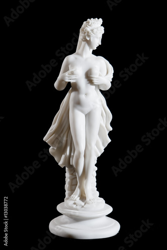 Classic white marble statue of a woman isolated on black
