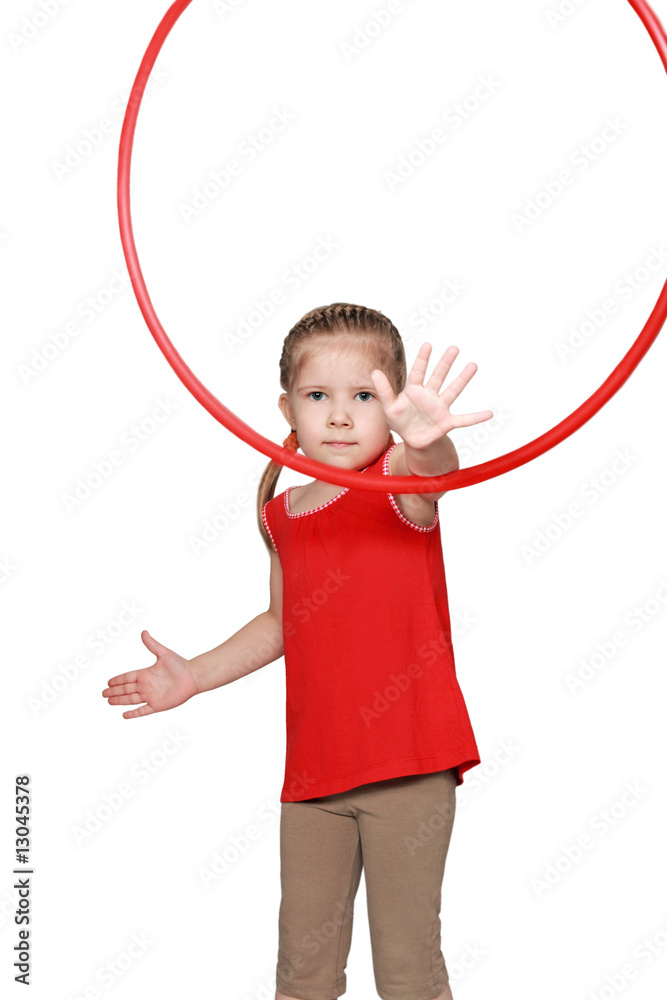 The girl turns her hand to the hoop