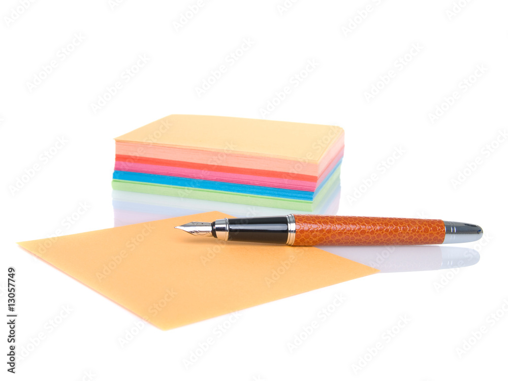 notes block and pen isolated on a white background notes block and pen isolated on a white background
