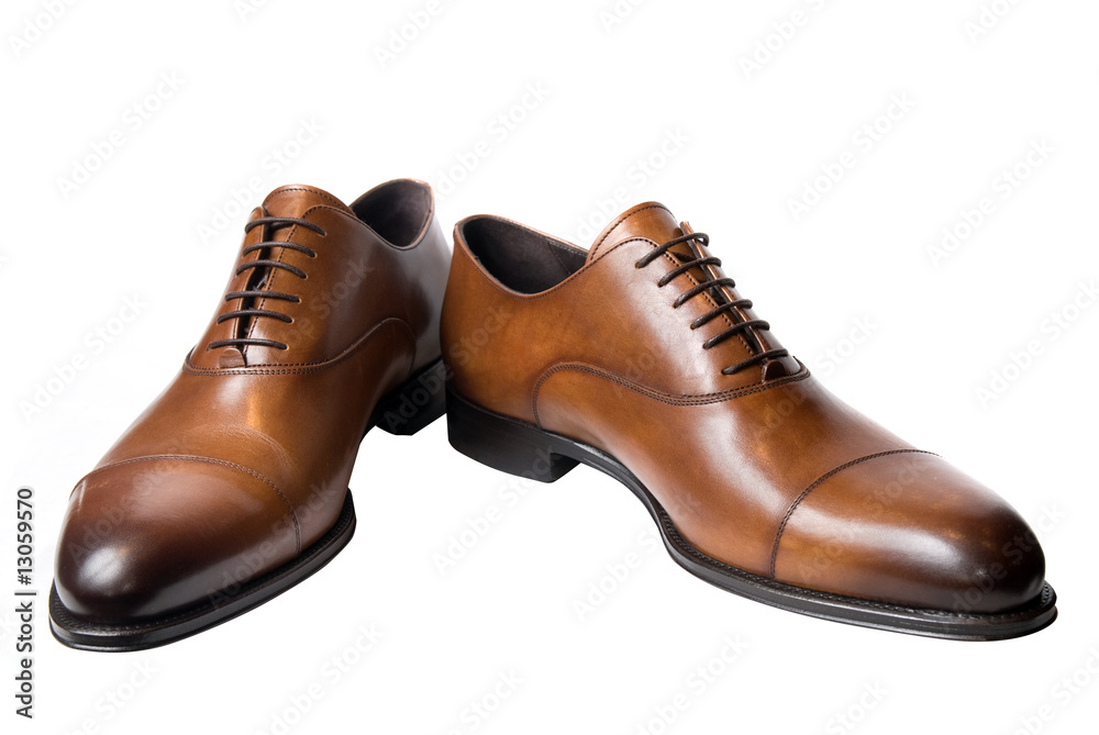 classic brown male leather shoes isolated on white classic brown male leather shoes isolated on white