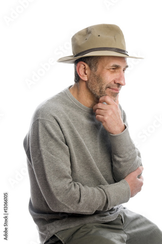 middle age man adventure hat thinking senior