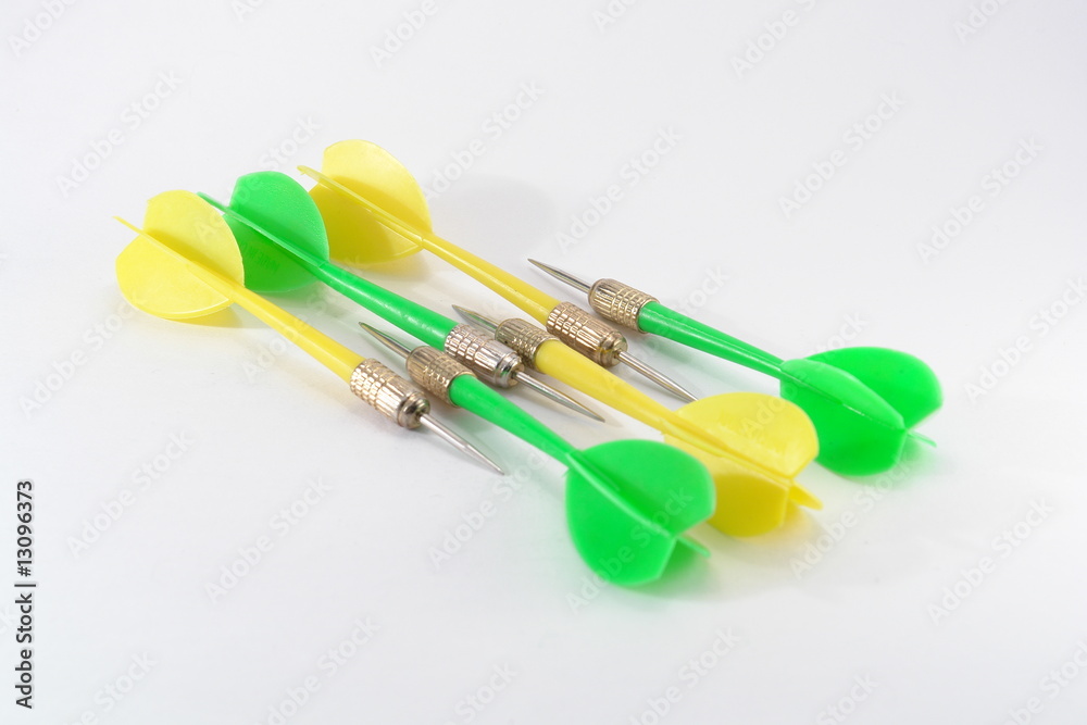 Multi-coloured darts on a white background Multi-coloured darts on a white background