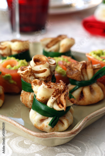 Blinis with sour cream and red caviare.