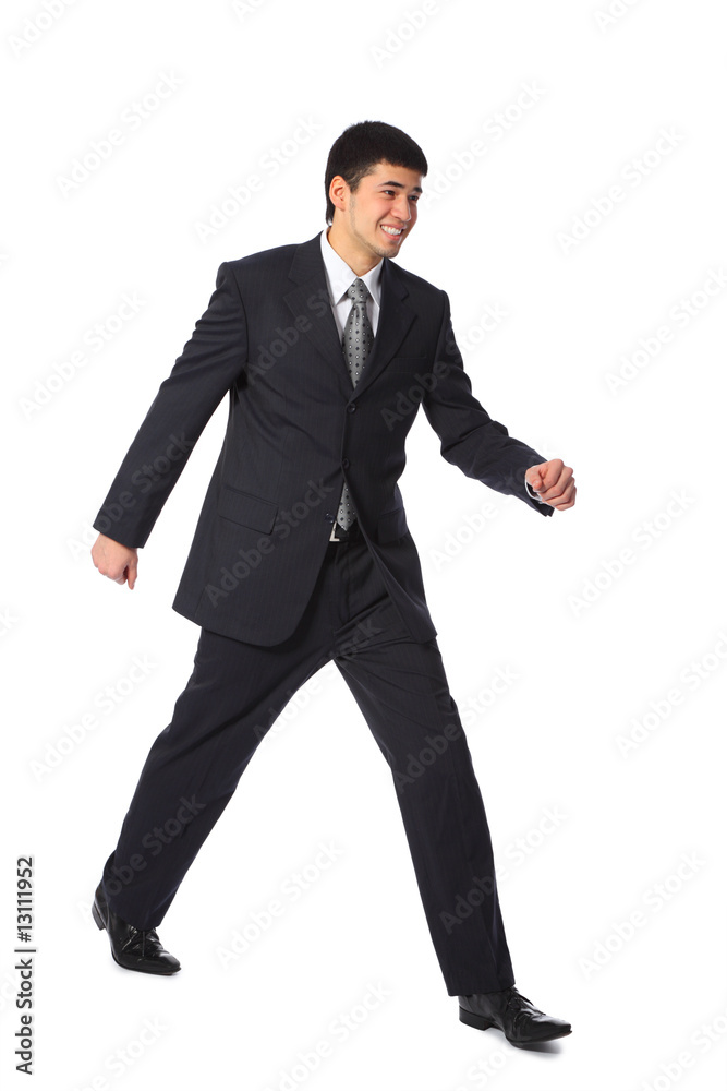 young smiling asian businessman full body walks young smiling asian businessman full body walks