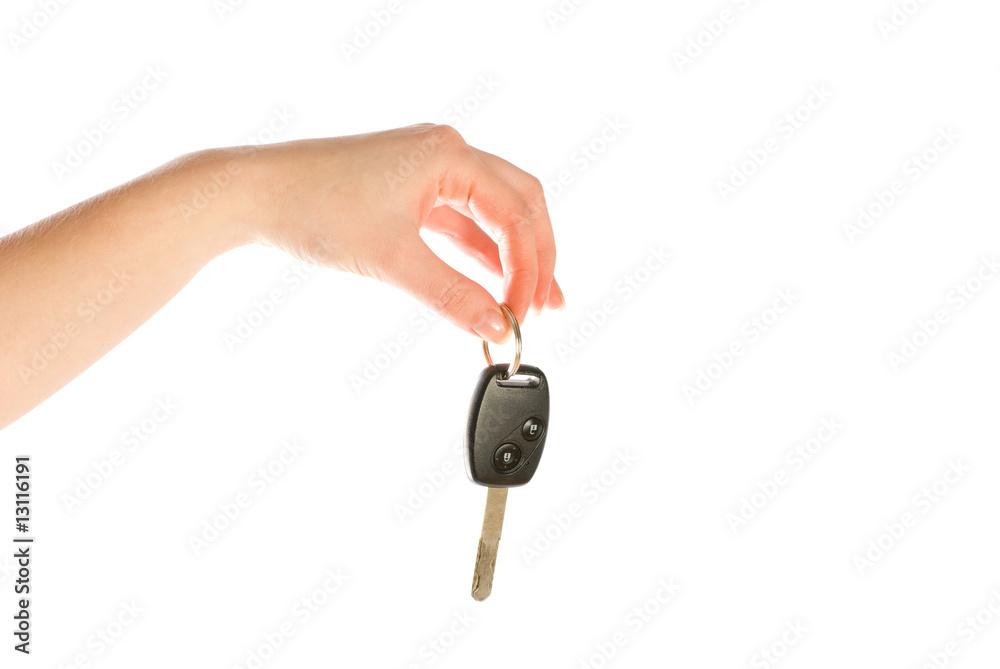 Hand giving a key isolated on white background Hand giving a key isolated on white background