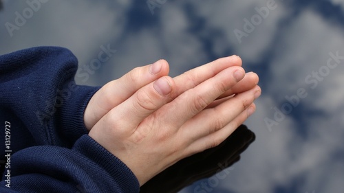 Child hands at prayer
