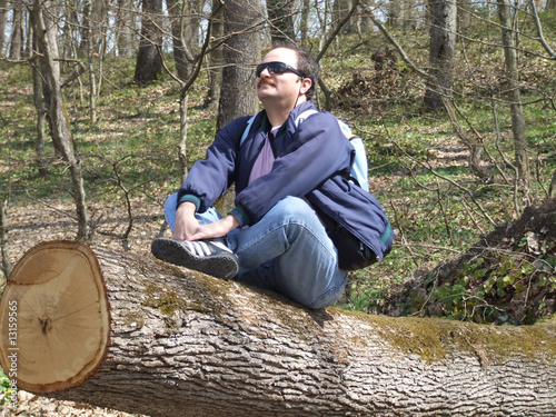 sitting on a log