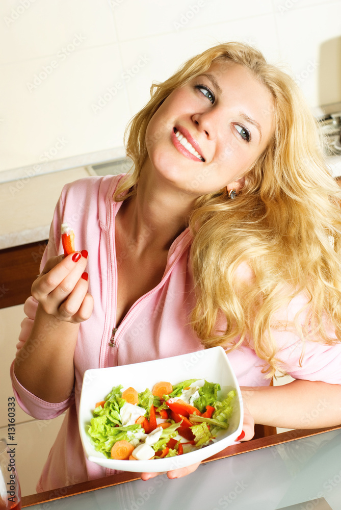 pretty girl eating salad
