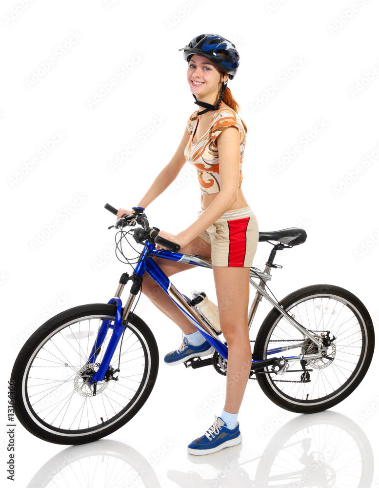 Obraz premium Young beautiful girl with her bike
