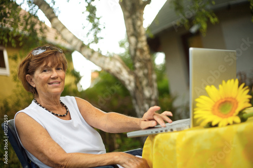Senior women with laptop