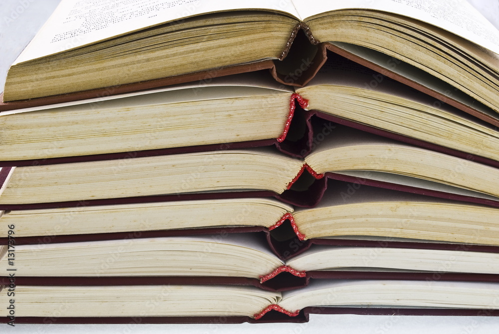 Fototapeta premium Open old books pile
