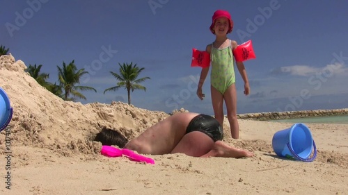 Child playing on the beach