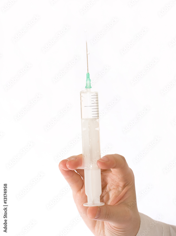 Medical syringe in front of a white background Medical syringe in front of a white background