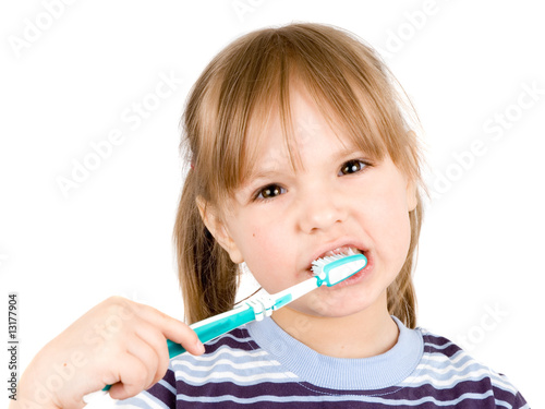 little girl with toothbrush