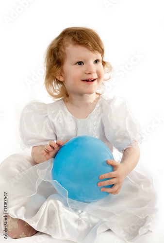 Cute little girl with the air balloon