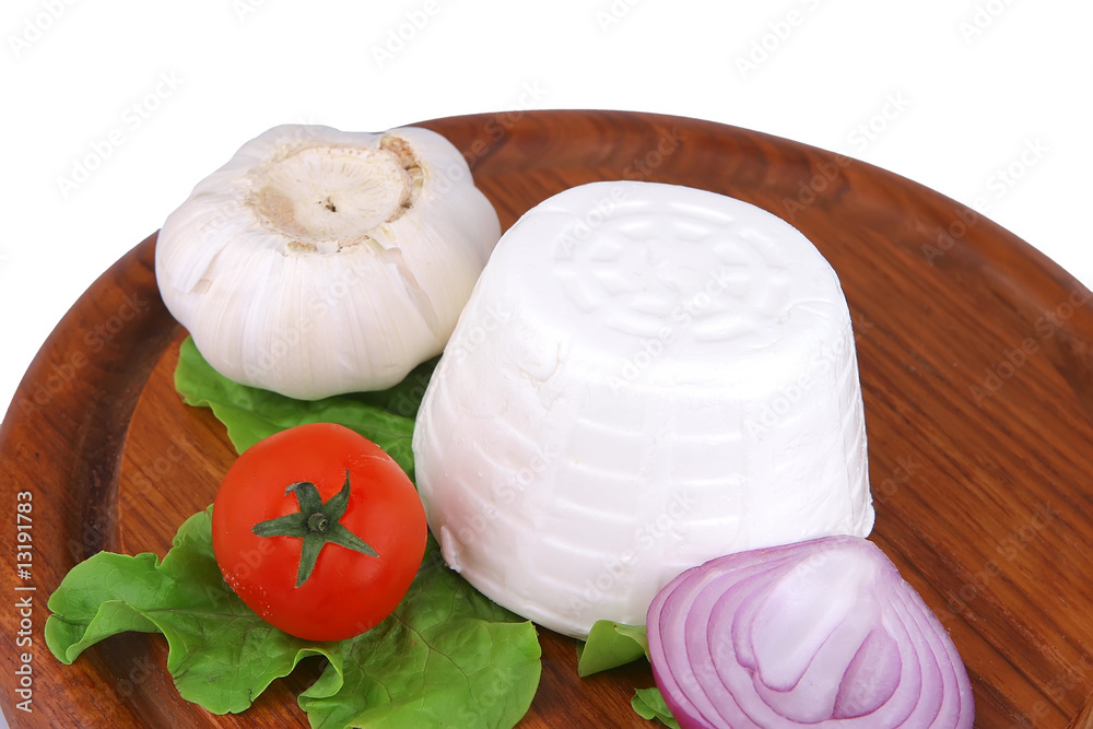white goat cheese on wood white goat cheese on wood