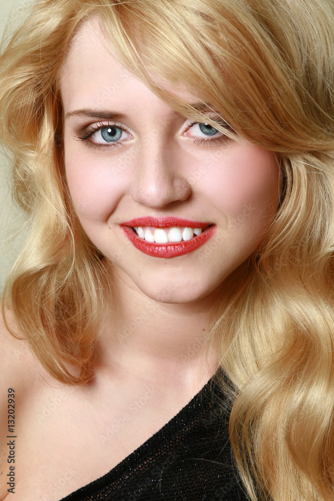 Close-up portrait of a satisfied young girl Close-up portrait of a satisfied young girl