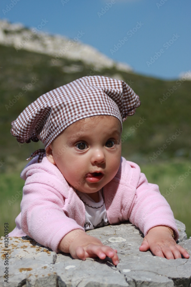 portrait bébé portant un fichu provençal Stock Photo | Adobe Stock