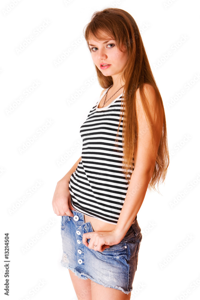Fototapeta premium Cute young girl in blue jeans skirt