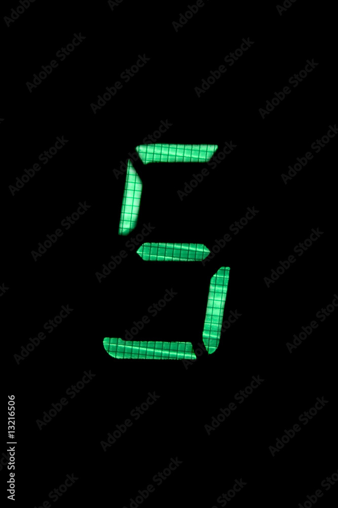 digital number five in green on black background digital number five in green on black background