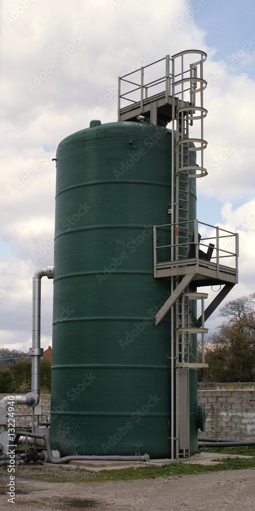 Water tank with scaffolding ladder