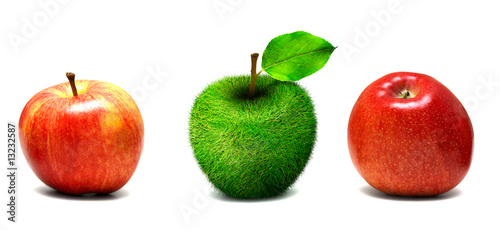 Apple made of grass among real apples