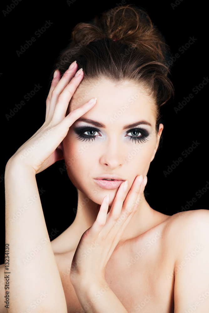 Fototapeta premium Dark hair young woman portrait, studio shot