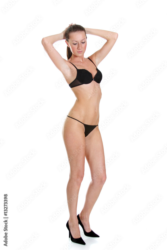 Beautiful underwear model posing on a white background
