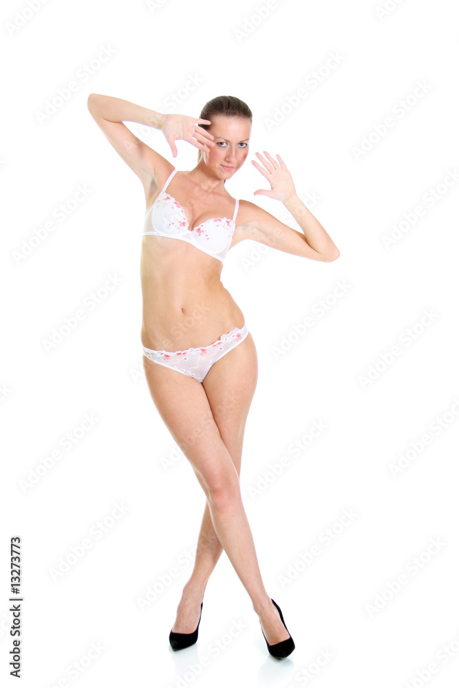 Beautiful underwear model posing on a white background Beautiful underwear model posing on a white background