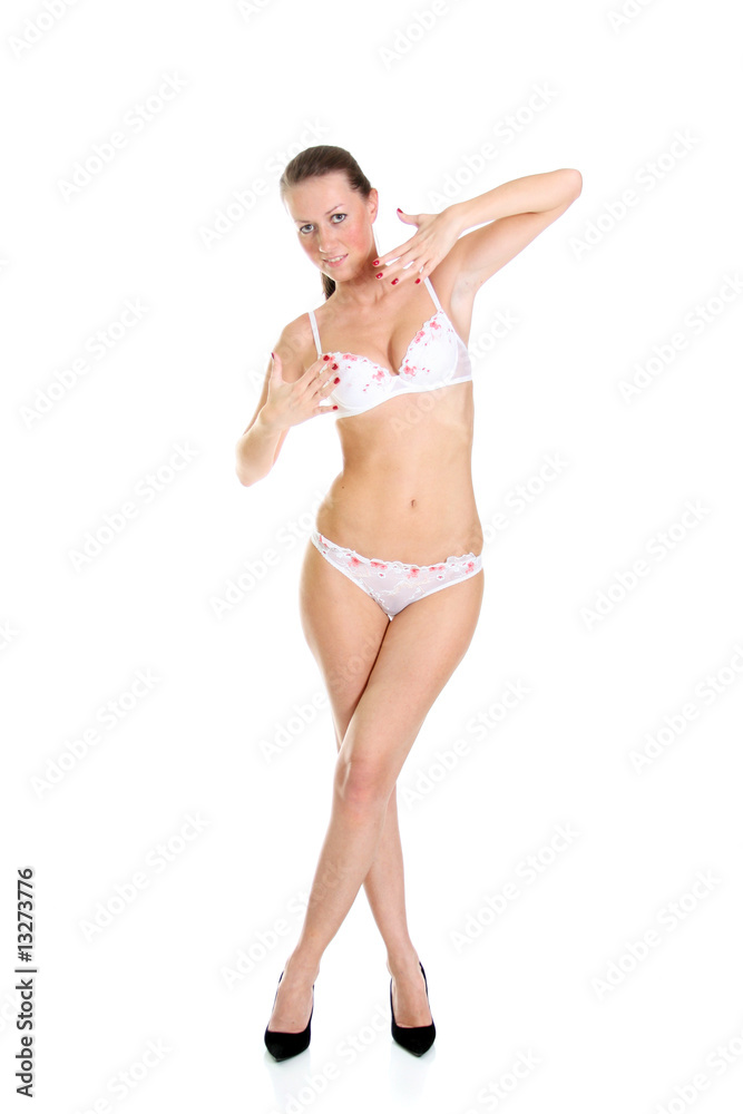 Beautiful underwear model posing on a white background Beautiful underwear model posing on a white background