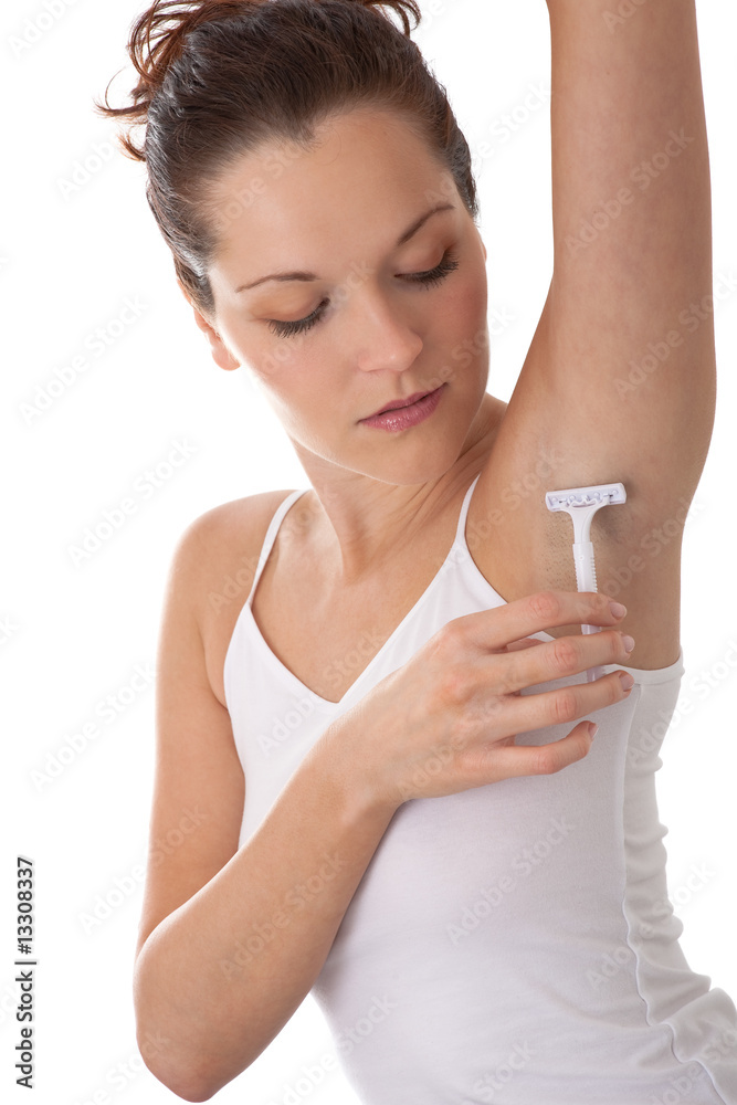 Body care series - Young woman shaving armpit Body care series - Young woman shaving armpit