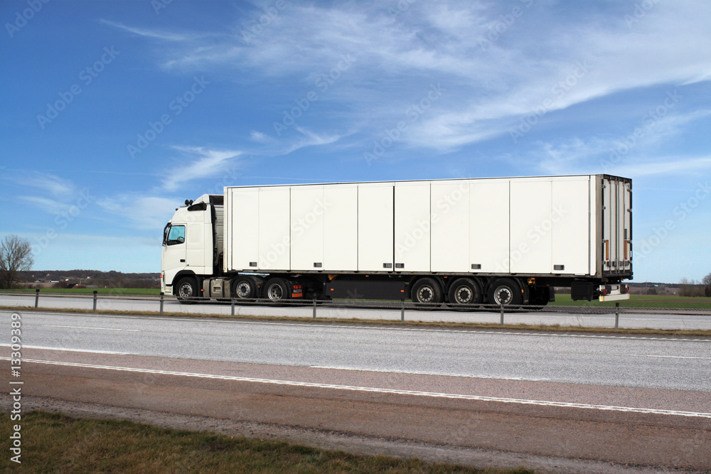 White truck and a pleasant blue sky. White truck and a pleasant blue sky.