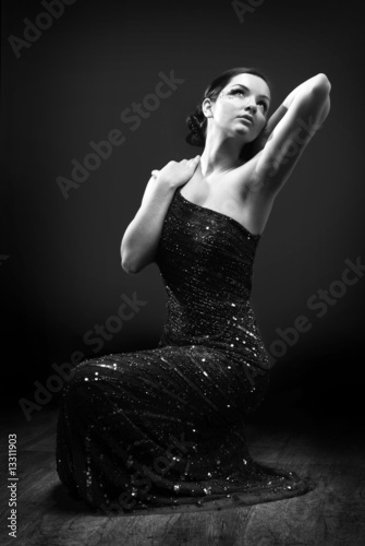 Glamorous woman dancing photo