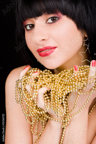 portrait of fashion woman with gold necklace