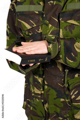 Soldier swear with hand on bible