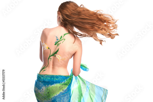 Sexy girl with bodyart on her back photo