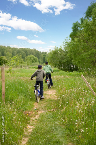 Two children on bicycles in the country
