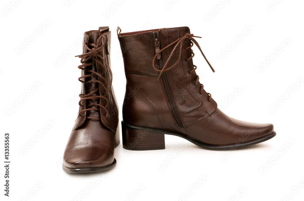 Brown boots isolated on the white background Brown boots isolated on the white background