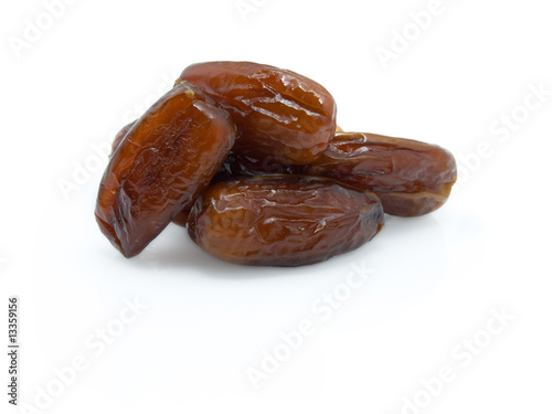 Dries dates on a white background